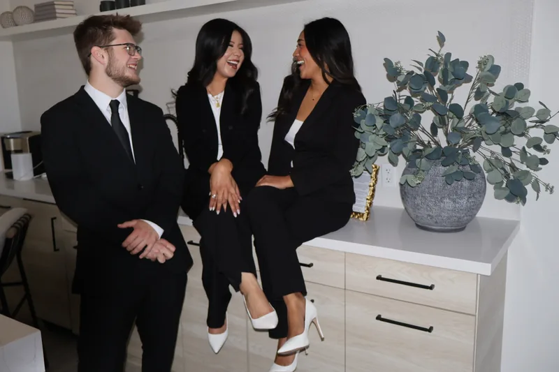 Three RAD team members in the office kitchen