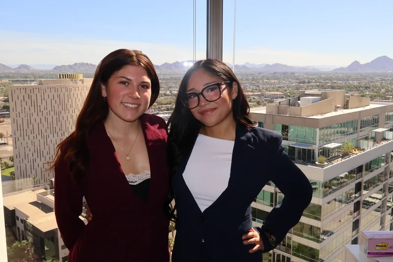 Two RAD colleagues in front of the Phoenix city view