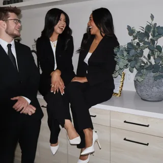 Three RAD team members in the office kitchen