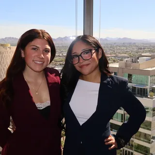 Two RAD colleagues in front of the Phoenix city view