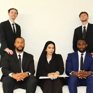 The RAD leadership team seated together in the office